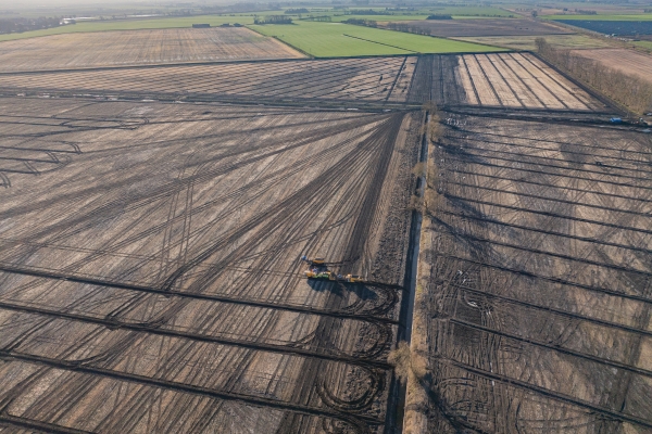 Aerial view of agricultural land showing William Morfoot Ltd machinery installing a dual-purpose drainage